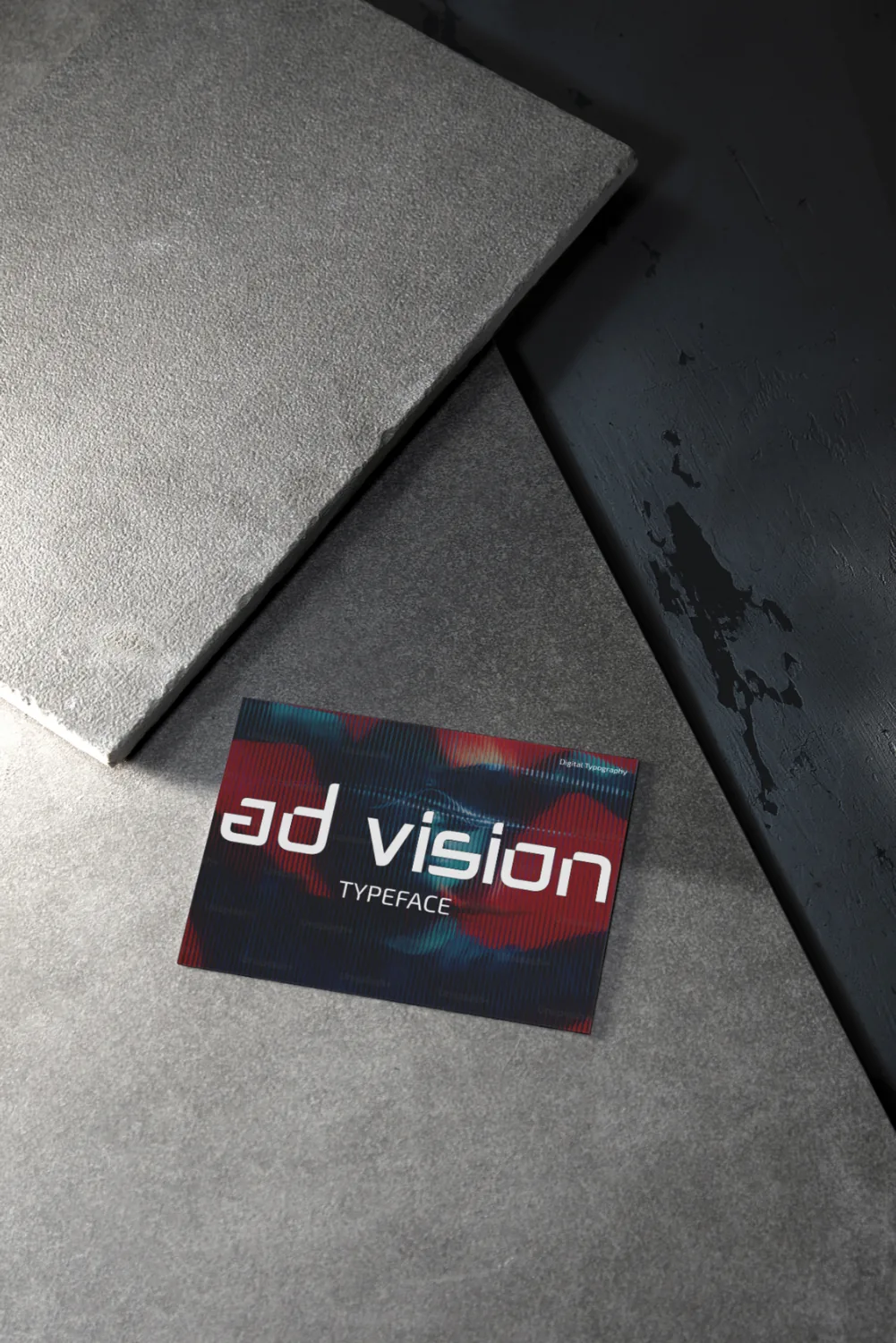 Ad Vision typeface — business card on concrete
